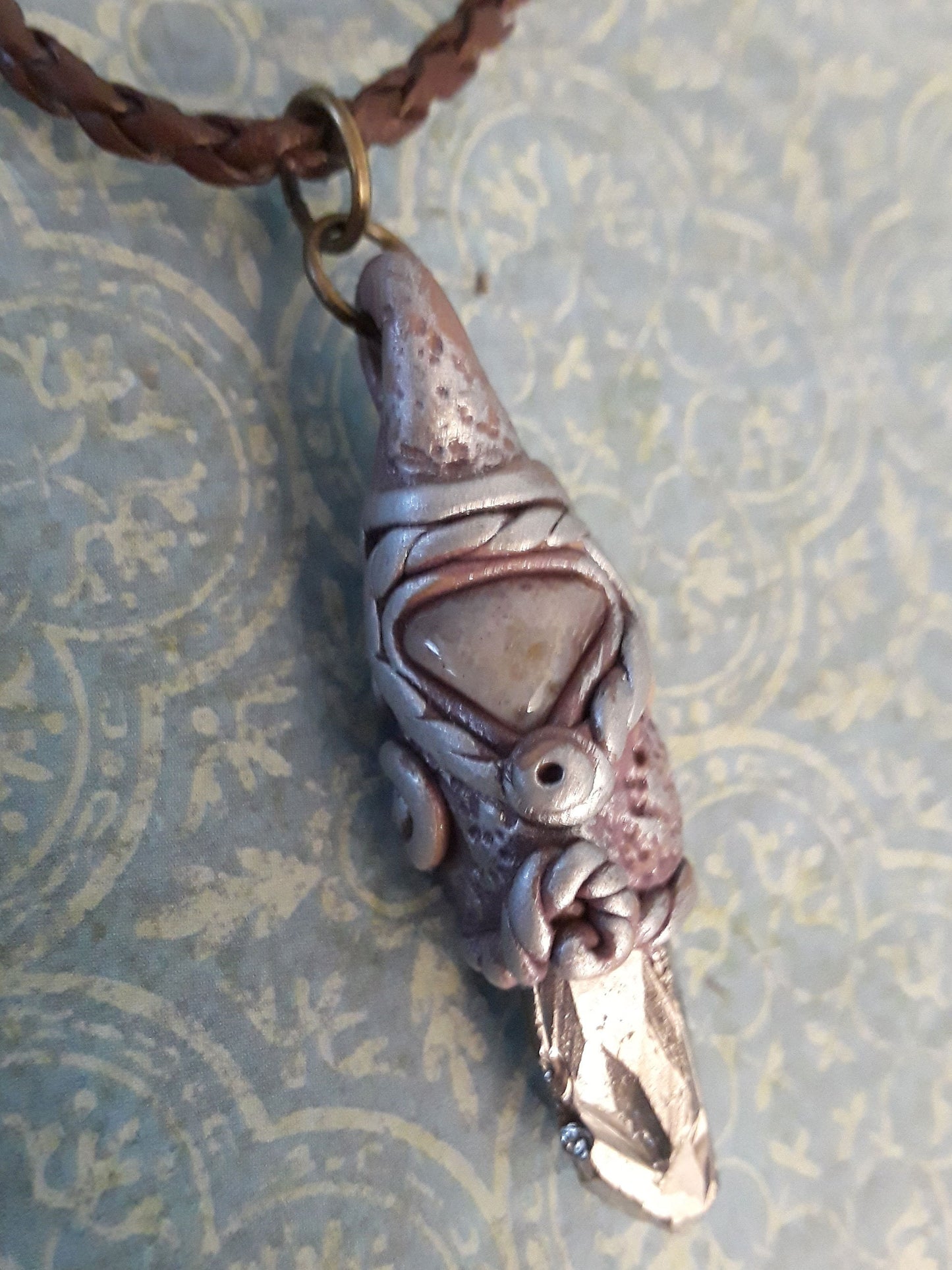 Organic Talisman. Titanium Coated Crystal and Agate Pendant encase in sculpted polymer clay.