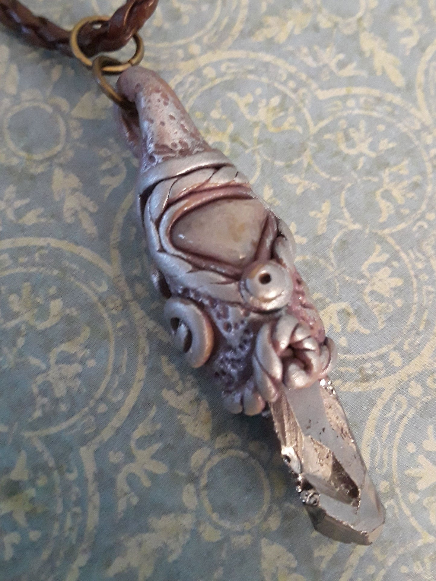 Organic Talisman. Titanium Coated Crystal and Agate Pendant encase in sculpted polymer clay.