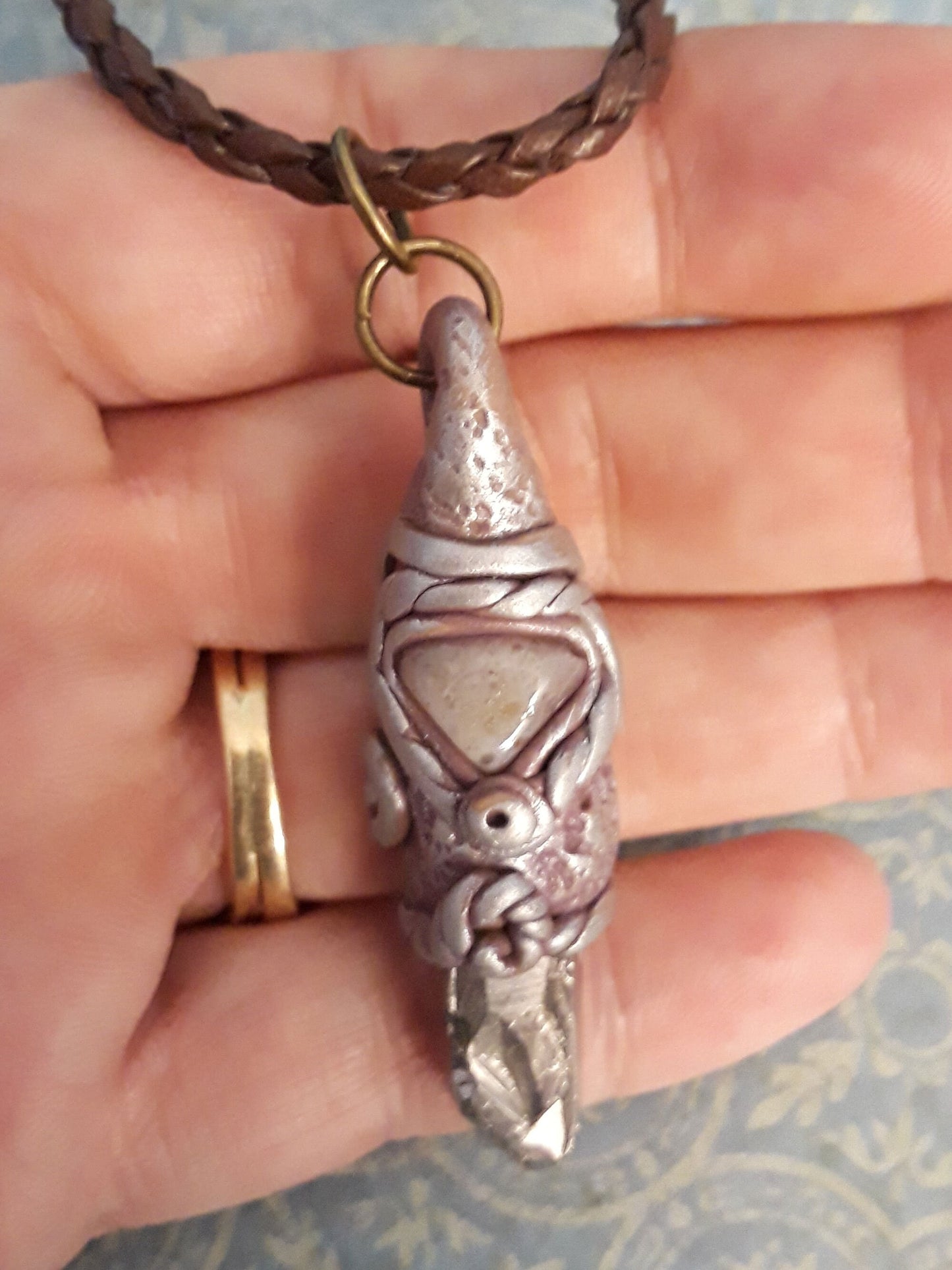 Organic Talisman. Titanium Coated Crystal and Agate Pendant encase in sculpted polymer clay.
