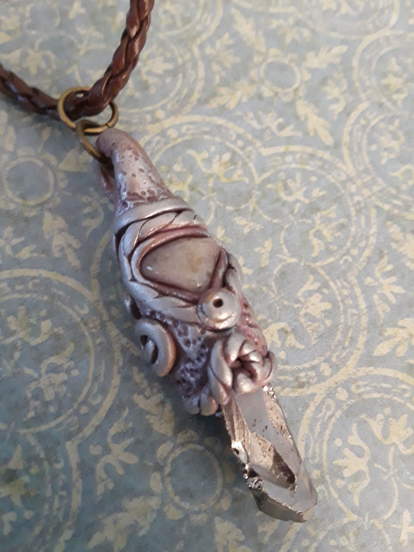 Organic Talisman. Titanium Coated Crystal and Agate Pendant encase in sculpted polymer clay.