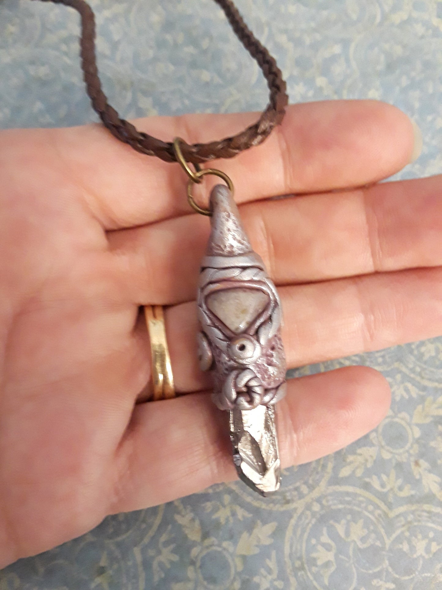Organic Talisman. Titanium Coated Crystal and Agate Pendant encase in sculpted polymer clay.