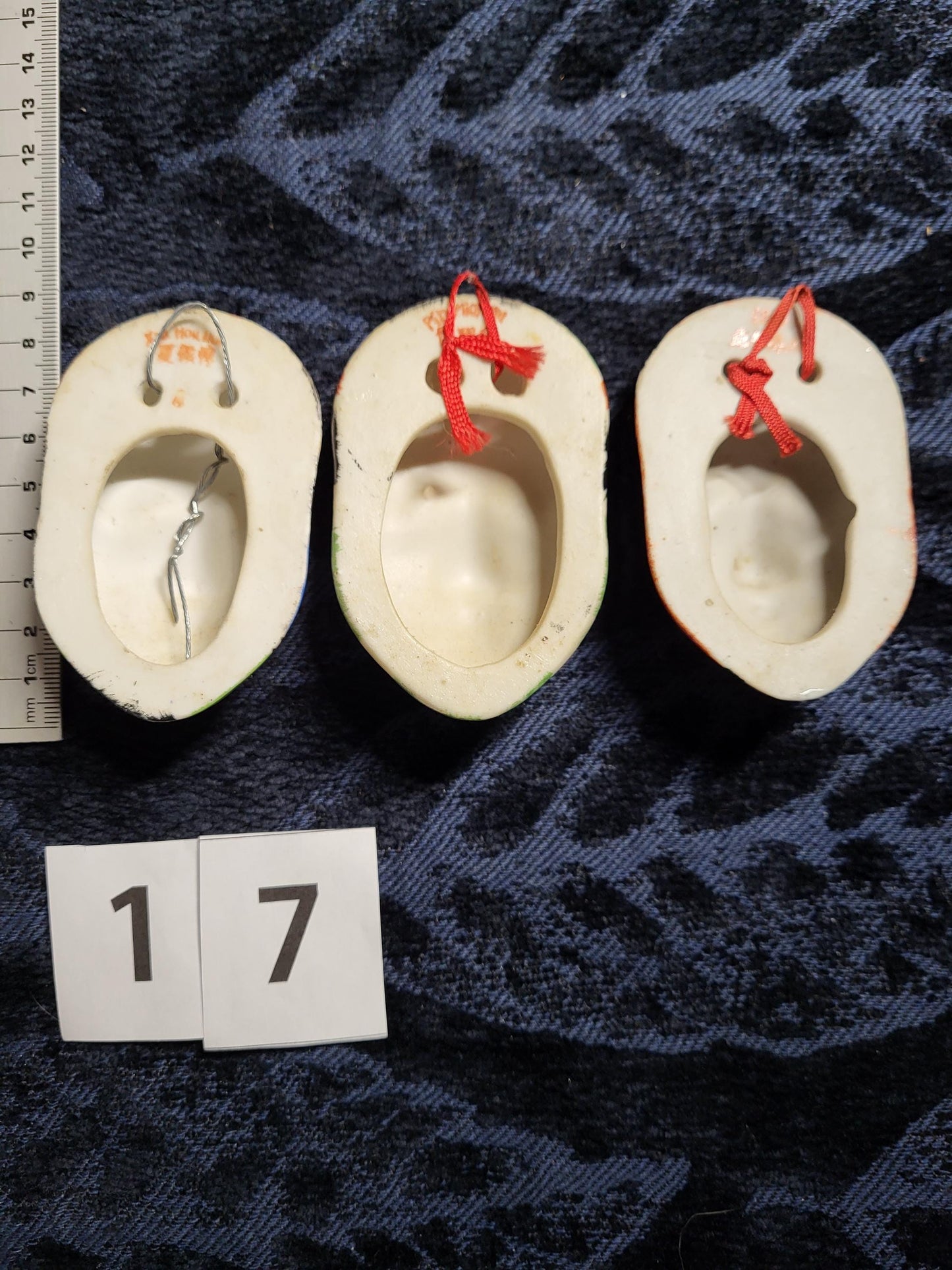 Small ceramic vintage masks. Could be Chinese or Japanese.